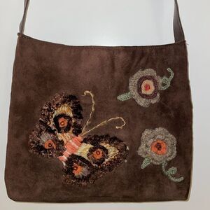 Cappelli Straworld, Inc. 3D brown butterfly and flower purse.
